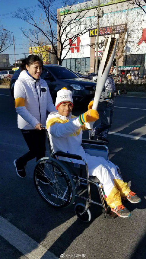 เด็กพิการจีน ถือคบเพลิงโอลิมปิกฤดูหนาว 2018