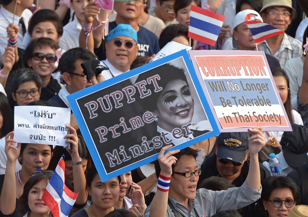 สื่อนอกชี้คนไทยลุกฮือคัดค้าน นิรโทษกรรม สัญญาณจุดจบยุค ทักษิณ
