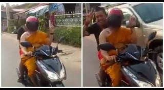 พระขี่มอเตอร์ไซค์